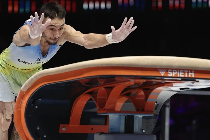 The coach of the gymnastics team