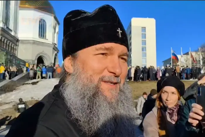 Religious figure in the form of the Metropolitan of the Russian Orthodox Church with an expression of hatred